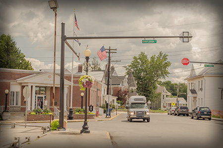 Country Road Transit Bus on route near Buckhannon, WV City Hall building.